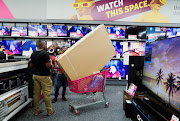 A shopper buys electronic goods during a Black Friday sale in Johannesburg. Takealot says the Hisense live stream was seventh of the 10 products purchased on its platform in early sales.