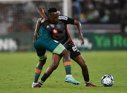 Ben Motshwari of AmaZulu challenges Patrick Maswanganyi of
Pirates during their Nedbank Cup quaterfinal match on Saturday.