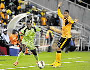 MISSED: Michael Mabule of Platinum Stars and George Lebese of Kaizer Chiefs look frustrated as the ball evades them during the Absa Premiership match at Peter Mokaba Stadium in Polokwane last night. The game ended in a 2-2 draw