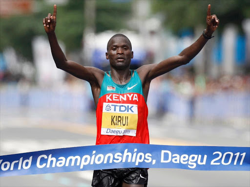 Abel Kirui of Kenya celebrates winning the men's marathon at the IAAF World Athletics Championships in Daegu, September 4, 2011. REUTERS