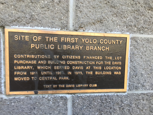 SITE OF THE FIRST YOLO COUNTY PUBLIC LIBRARY BRANCH CONTRIBUTIONS BY CITIZENS FINANCED THE LOT PURCHASE AND BUILDING CONSTRUCTION FOR THE DAVIS LIBRARY, WHICH SERVED DAVIS AT THIS LOCATION FROM...