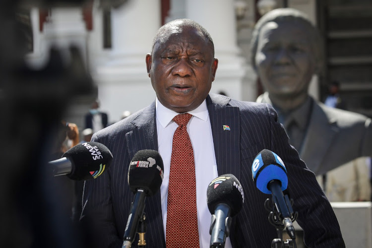 President Cyril Ramaphosa speaks to the media outside parliament in Cape Town on Thursday, November 11 2021. Picture: BLOOMBERG/DWAYNE SENIOR