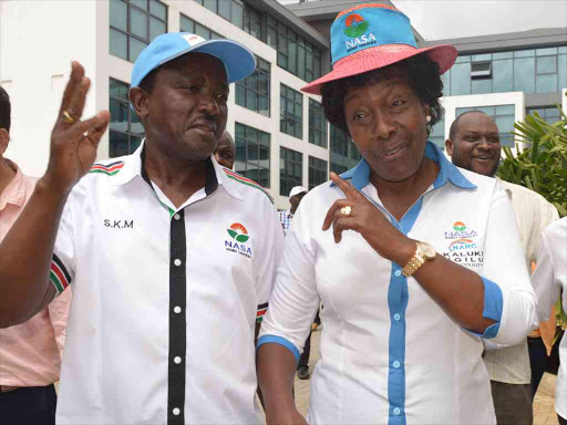 A file photo of Wiper chief Kalonzo Musyoka with Narc leader Charity Ngilu at English Point Marina in Mombasa. /JOHN CHESOLI