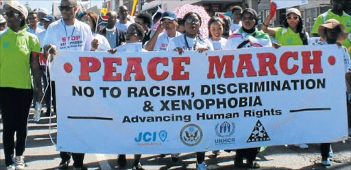 TELLTALE SIGNS: More than 100 refugees, community members, various non-profit organisations and officials from various government departments participated in the anti-xenophobia peace march yesterday morning Picture: SUPPLIED