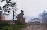 Ruins of a fireworks plant is seen on fire after an explosion in Liling, Hunan province. Picture Credit: Reuters