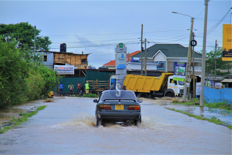 Vehicles along the flooded Syokimau-Katani road in Machakos County on Sunday, April 21, 2024.