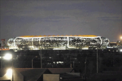 YOU BEAUTY YOU: The imposing soccer City was officially handed over to the City of Johannesburg yesterday. Pic.Antonio Muchave. 01/03/2010. © Sowetan.