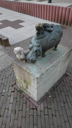 Woman on Animal Statue 