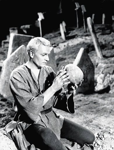 WHERE'S WILLY? Laurence Olivier in conversation with the skull of Yorick in the 1948 Universal-International production of 'Hamlet'