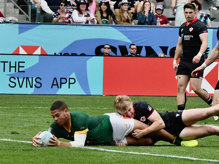 The Blitzboks' Zain Davids goes over for a try during their match against Canada on day 3 of the 2024 Los Angeles Sevens at Dignity Health Sports Park on Sunday.