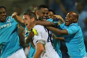 James Keene celebrates scoring a goal with teammates during the Absa Premiership match. File photo