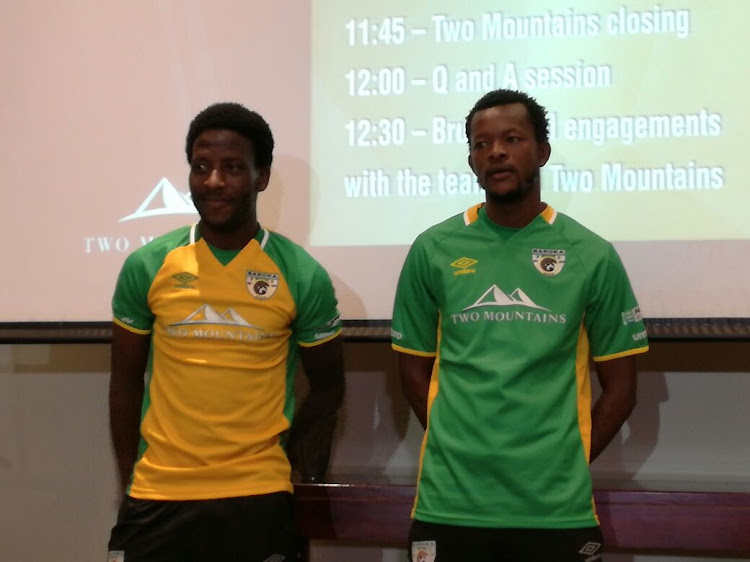 Baroka FC captain Olaleng Shaku (R) and midfielder Siphelele Ntshangase during the unveiling of the club's home and away playing kit in Sandton on Wednesday 11 October 2017.