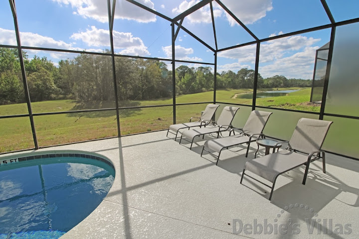 Top up your tan on the southwest-facing pool deck of this Emerald Island villa