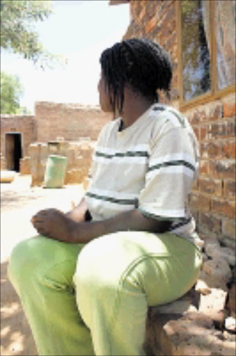 VICTIM: She's been waiting for eight years, and still has to wait. 14/12/08. Pic. Alfred Moselakgomo. © Sowetan.