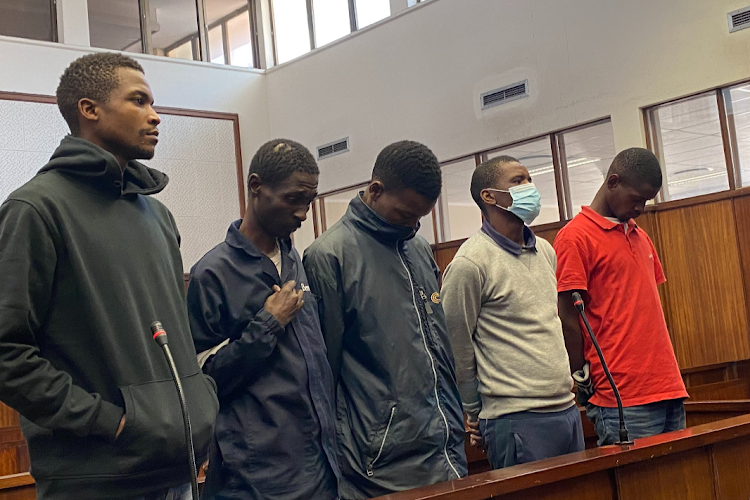 Sihle Mkhize, Siyabonga Mahaye, Kwanele Makhaye, Siyabonga Mkhize and Thobani Mhlongo appear in the Durban magistrate's court in connection with the murder of MUT electrical engineering lecturer Shan Dwarika. Charges against Mkhize were withdrawn. File photo.