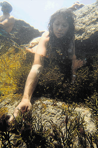 POOL RESOURCES: Roushanna Gray collects seaweed