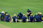 Ottis Gibson (C) coach of South Africa having a chat with players during the South African national mens cricket team training session at Pallekele International Cricket Stadium on August 03, 2018 in Balagolla, Sri Lanka. 