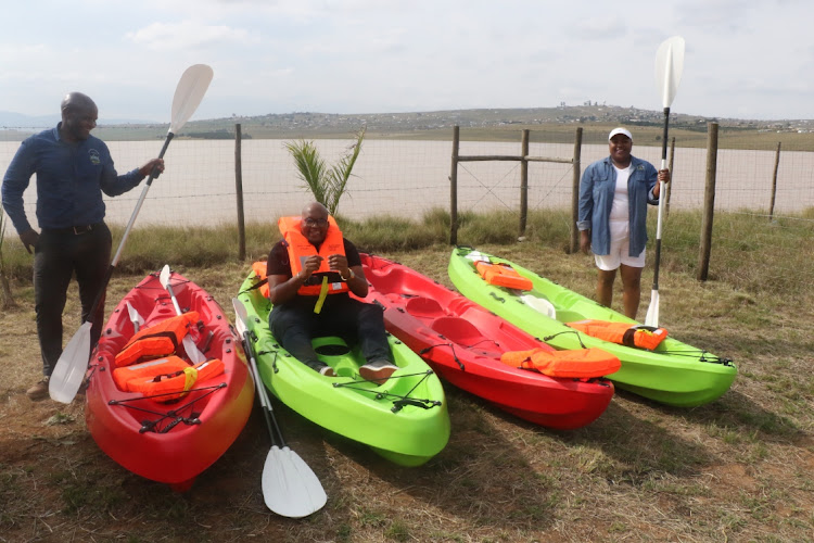Young Mthatha business Live Mabeqa(middle) has started a kayak business at the Mthatha Dam, thanks to a donation of six kayaks from OR Tambo district municipality. He is flanked by KSD municipality's rural and economic development director Mbuyiseli Mandla and OR Tambo district municipality's tourism manager Bulelwa Ntakana.