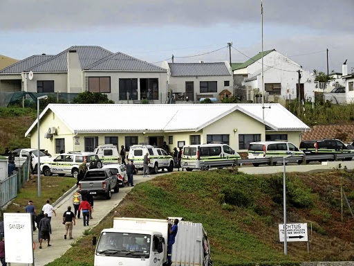 Police and Hawks swoop on the department of agriculture, forestry and fisheries building in Gansbaai during a raid where government officials were arrested last year.