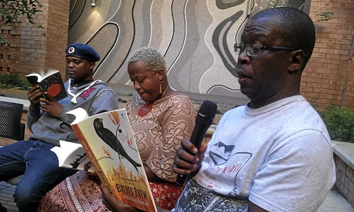 Niq Mhlongo, Zukiswa Wanner and Fred Khumalo promoting literature at the Sol Plaatje University in Kimberley, Northern Cape, one of the four cities they visited recently. / SUPPLIED