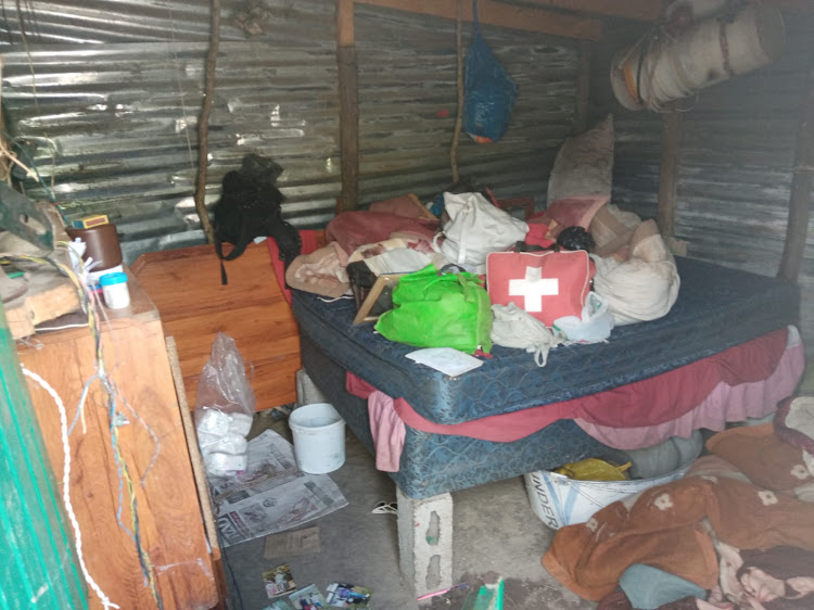 The shack where the slain mother and children were found.