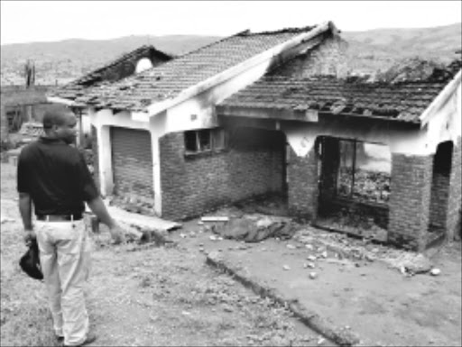 RAZED: The remains of businessman Solomon Maunatlala's house which were torched by residents of Khopo and Lephepane outside Tzaneen this week. Pic: ALEX MATLALA. 25/01/2010. © Sowetan.