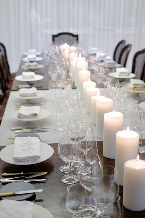 The beautiful table setting awaiting the guests.