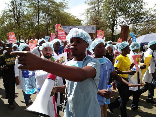 Doctors in Kisumu during a protest in February in a show of solidarity with KMPDU officials jailed during the doctors' strike. /FAITH MATETE