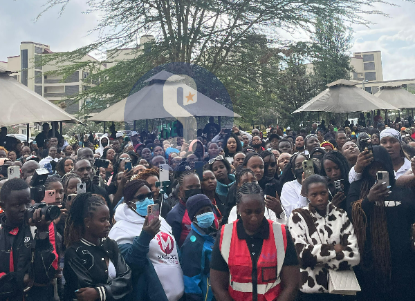 Mourners follow proceedings during collection of the body of TikToker Brian Chira from the Kenyatta University mortuary for burial at the family home in Gathanje, Ingitei village, Githunguri in Kiambu County, March 26, 2024.
