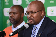 Cricket South Africa (CSA) president Chris Nenzani (R) and the chief executive Thabang Moroe (L) during the CSA media briefing at Mangaung Oval on October 06, 2017 in Bloemfontein, South Africa.