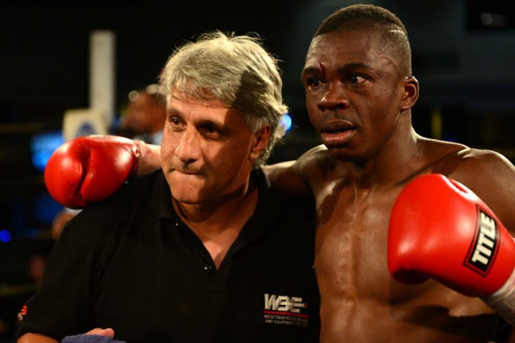 Bantamweight fighter Rofhiwa Nemushungwa (R) during the Christmas Cracker Box and Dine at Emperors Palace on December 04, 2017 in Johannesburg, South Africa.