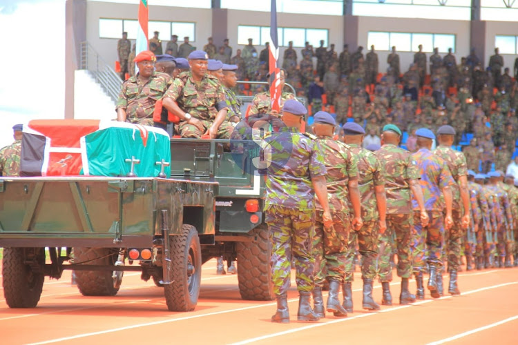 The body of the late General CDF Francis Ogolla is given the final salute by fellow KDF members at Ulinzi Sports Complex, Lang'ata, on April 20, 2024.