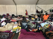 The refugee camp in Bellville. Males older than 18 sleep in their own marquee. They may visit the female marquee after 9am. 