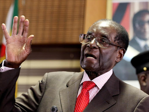 Zimbabwe's President Robert Mugabe gestures during his 93rd birthday celebrations in Harare, Zimbabwe, February 21, 2017. /REUTERS