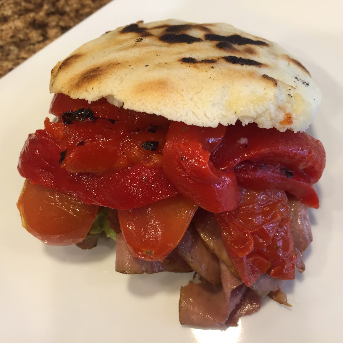 Arepa with roast beef and roasted veggies