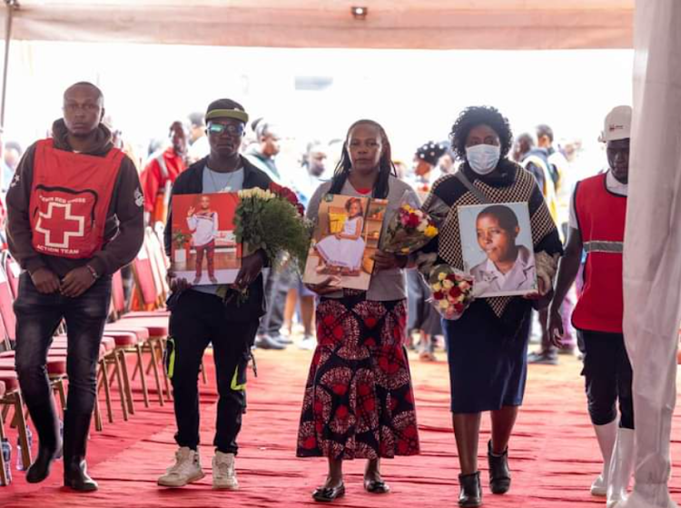 Families and relatives during a memorial service of Mai Mahiu flood victims on May 9, 2024
