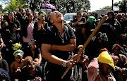 A University of KZN student is overcome with emotion during a protest over security  on campus. 