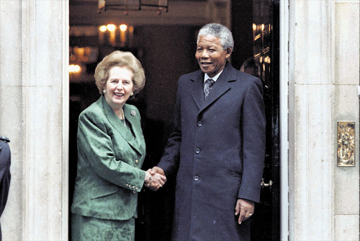 British Prime Minister Margaret Thatcher and recently released Nelson Mandela before talks at 10 Downing Street on July 4 1990