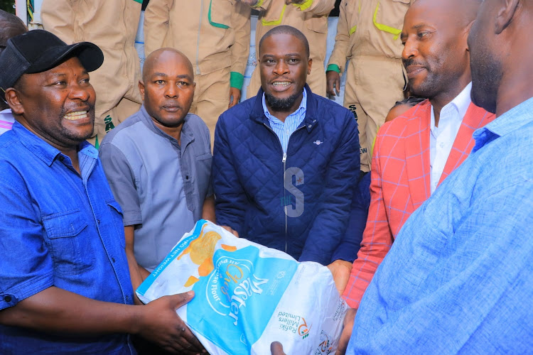 Nairobi Governor Johnson Sakaja distributes relief food to victims of floods in Kibera on April 29, 2024.