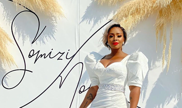 Rapper Boity showed off the Orapeleng Modutle Style Avenue dress she donned to Somhale's white wedding on Instagram.