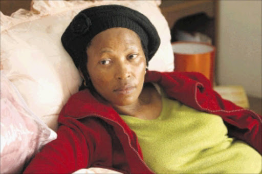 GRIEVING: Portia Sekgabi, the wife of Colonel Moloantoa Sekgabi, who was shot dead by ATM bombers. PHOTO: MABUTI KALI