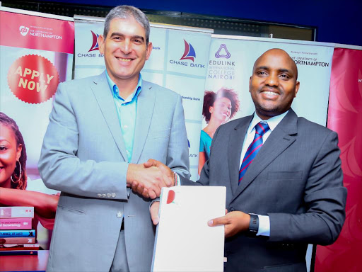 Chase Bank (IR) Receiver Manager Mr. Paul Russo and Edulink Managing Director Mr. Simo Dibasic at the MOU signing that will see the two institutions enter a partnership to offer students an easy fees payment platform/ COURTESY