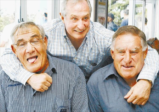 RUGBY LEGENDS ... Three of the most famous rugby players of their time (from left) South Africa’s Frik du Preez, Gareth Edwards, of Wales, and All Black Colin Meads, having fun at the Grey dinner. File photo