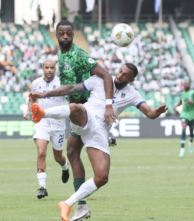 Carlos Akapo Martinez of Equatorial Guinea tackled by Ajayi Oluwasemilogo Adesewo of Nigeria during the Africa Cup of Nations match between Nigeria and Equatorial Guinea at the Alassane Ouattara Stadium in Abidjan, Cote dIvoire on Sunday