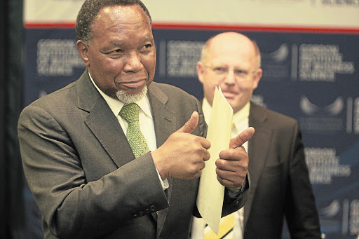 Deputy President Kgalema Motlanthe, with Gibs director Nick Binedell in the background