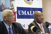 ANALYSING REPORTS: Chairperson of Umalusi Professor John Volmink (left) and chief executive officer Dr Mafu S Rakometsi. Pic: Peggy Nkomo. Circa 2009. © Sowetan.