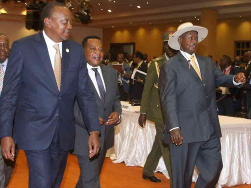 President Uhuru Kenyatta and Uganda’s Yoweri Museveni in Kampala for the 13th Northern Corridor Integration Projects summit on April 23 /PSCU