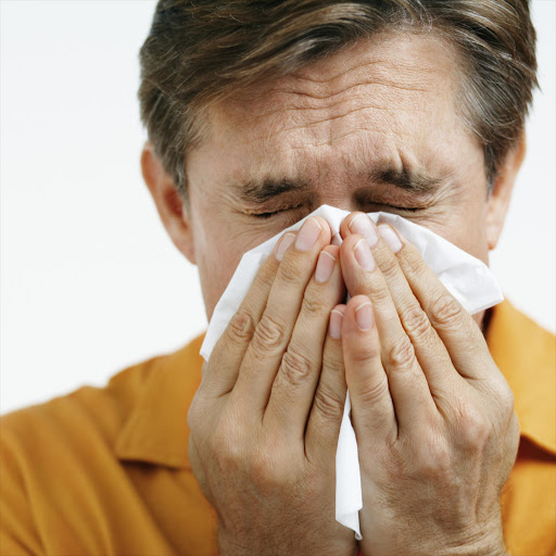 A man sick with flu.