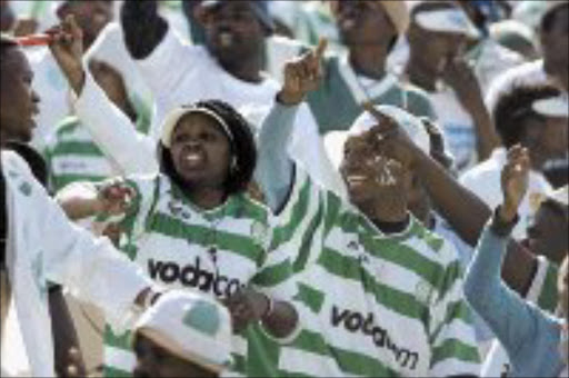 FULL VOICED: Bloemfontein Celtic fans will paint Durban green and white when the team visit Lamontville Golden Arrows on February 18. Pic. Antonio Muchave. 14/08/2005. © Sowetan.