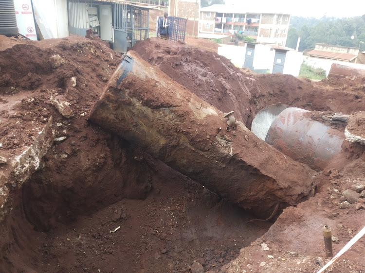 Petroleum underground storage tanks being removed at a pump station/ FILE